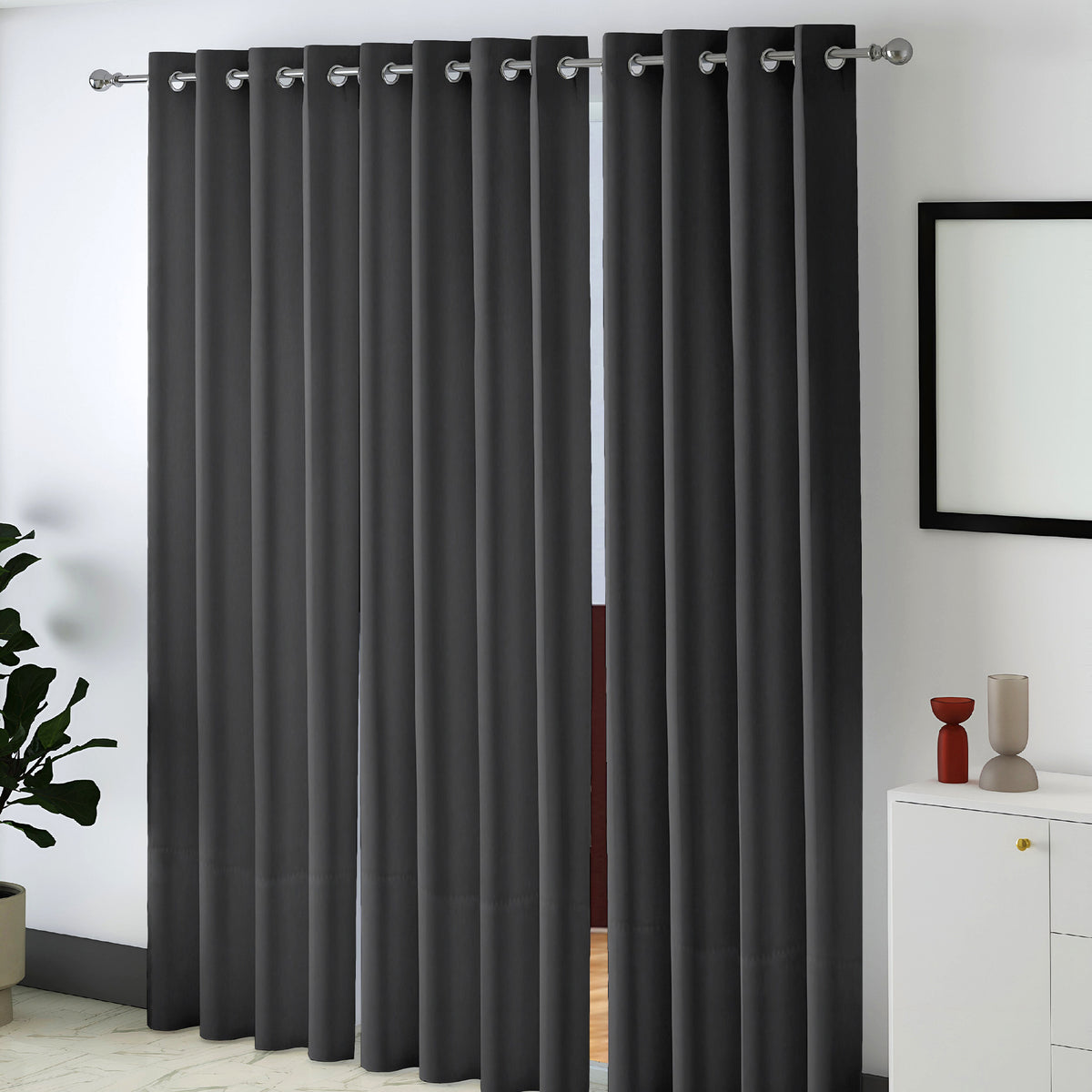 Black Serenity 250 GSM Polyester 100% Blackout Eyelet Curtain