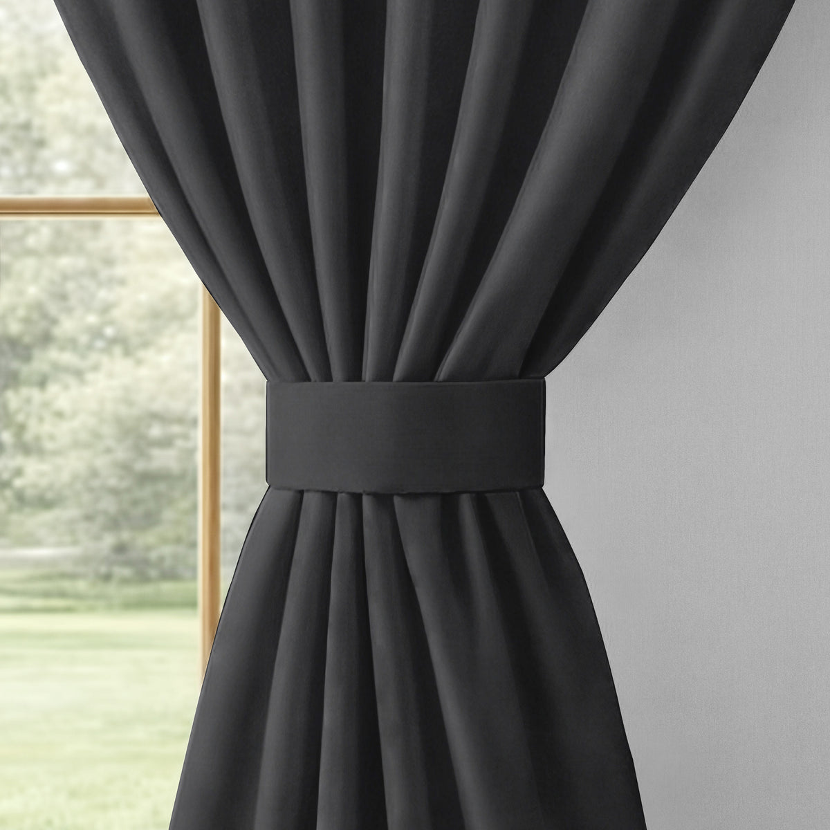 Black Serenity 250 GSM Polyester 100% Blackout Eyelet Curtain