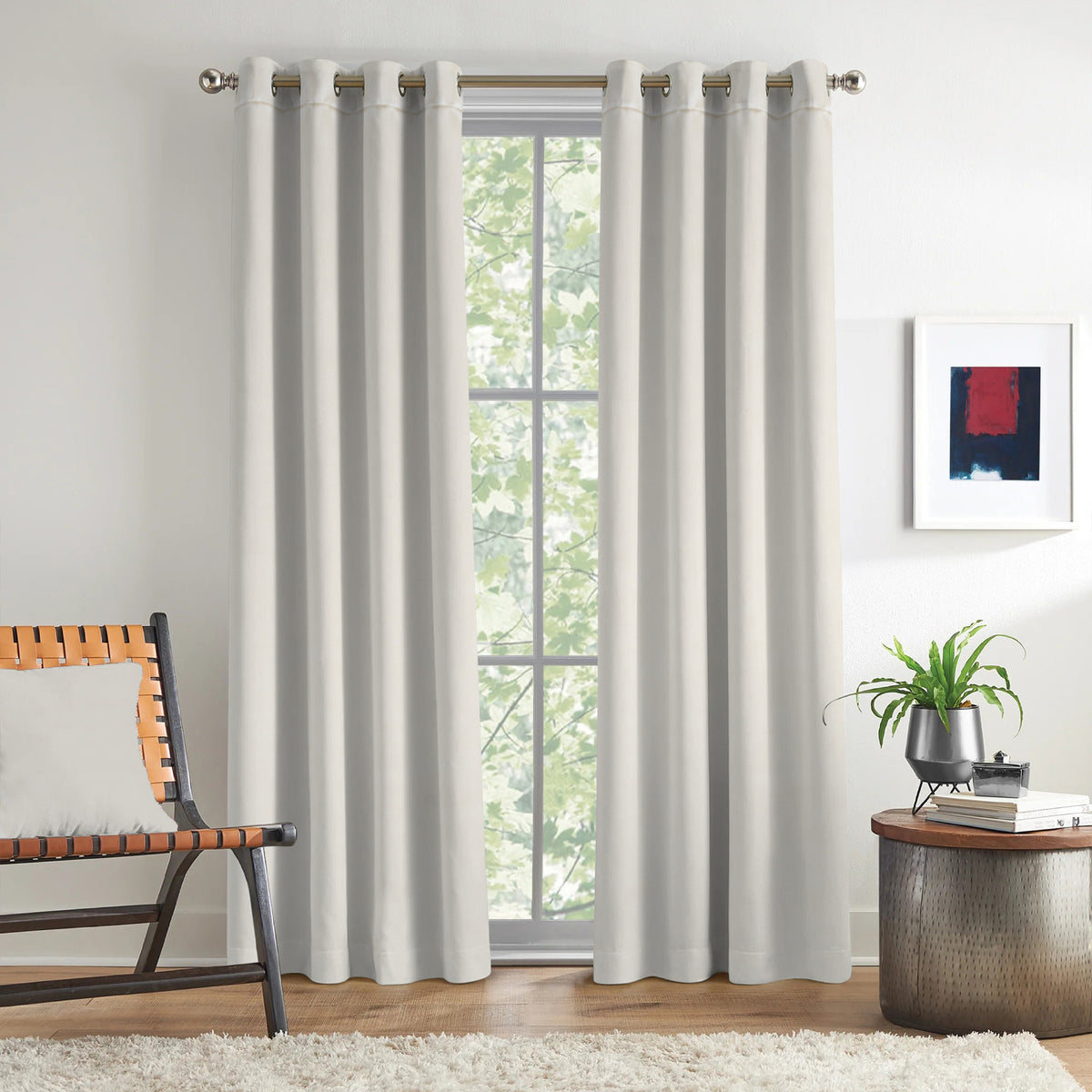 Ivory Serenity 250 GSM Polyester 100% Blackout Eyelet Curtain