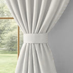 Ivory Serenity 250 GSM Polyester 100% Blackout Eyelet Curtain