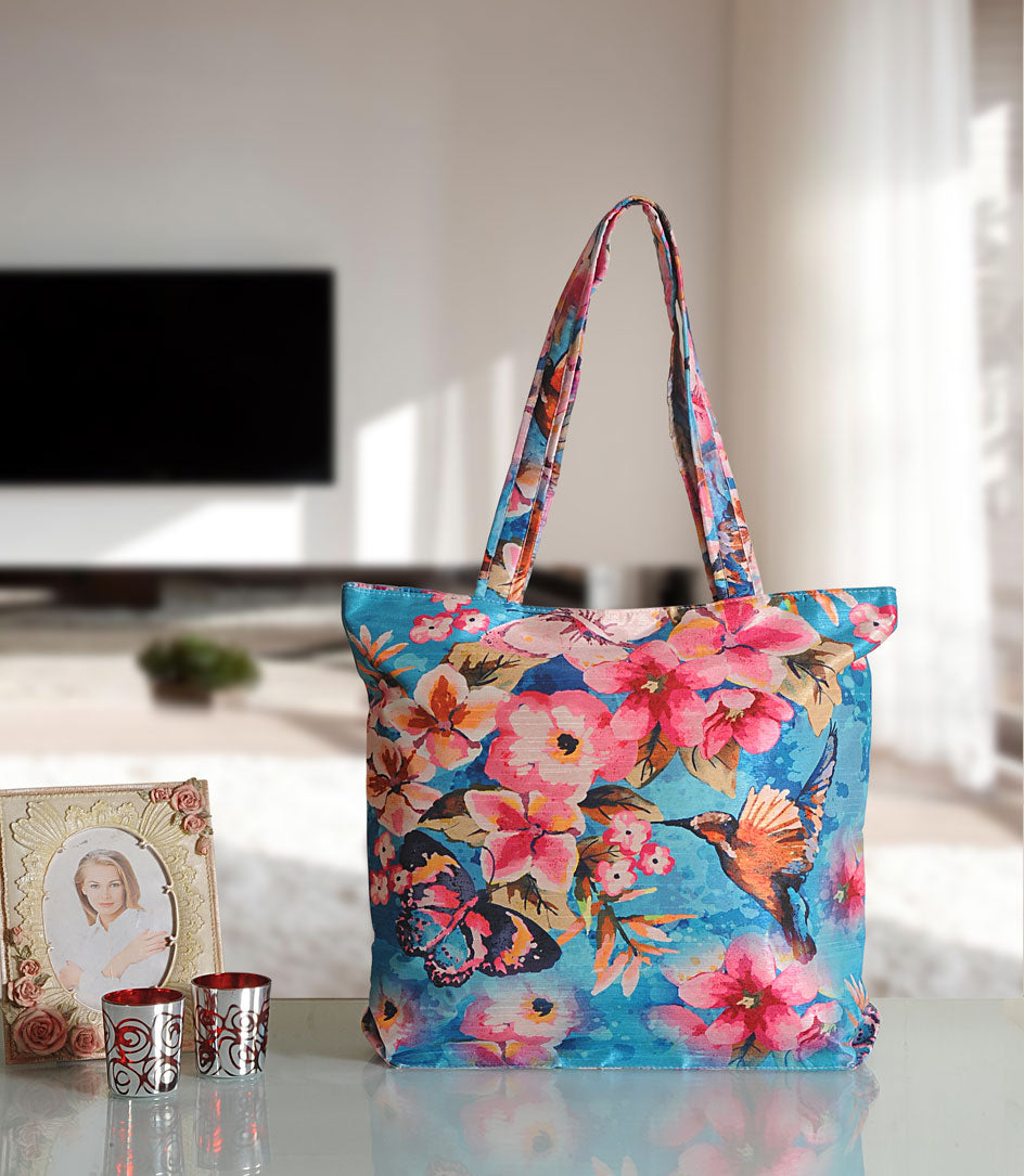 Tropical Bloom Butterfly Tote - Artistic Floral Print Shoulder Bag with Birds & Butterflies on Sky Blue Canvas